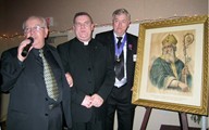 Knights of Columbus Council 1394 makes a donation of a picture of St Patrick to St Patrick's Parish